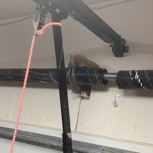 Cream colored garage door after service